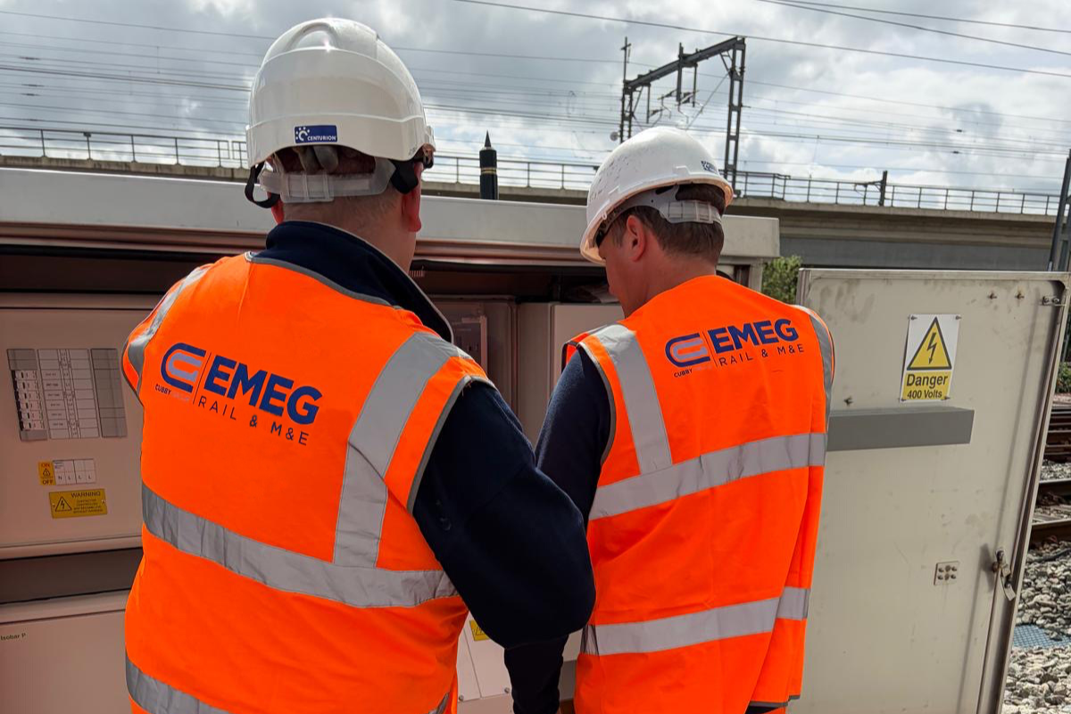 Emeg's rail depot maintenance vans outside design office